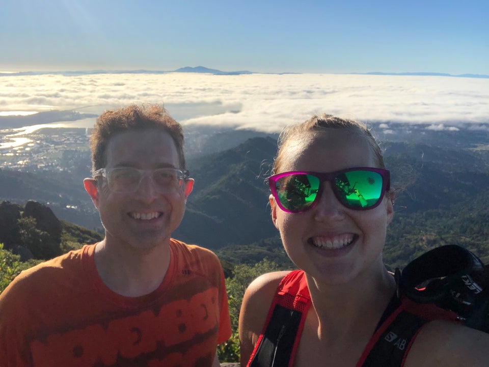 Tantek and Krissi on Mount Tam, hills and the bay behind them, disappearing into a cloudbank receding into the horizon
