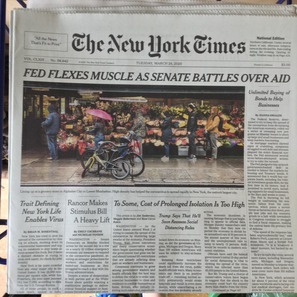 New York Times newspaper front page above the fold on March 24th, 2020 with main headline: FED FLEXES MUSCLE AS SENATE BATTLES OVER AID