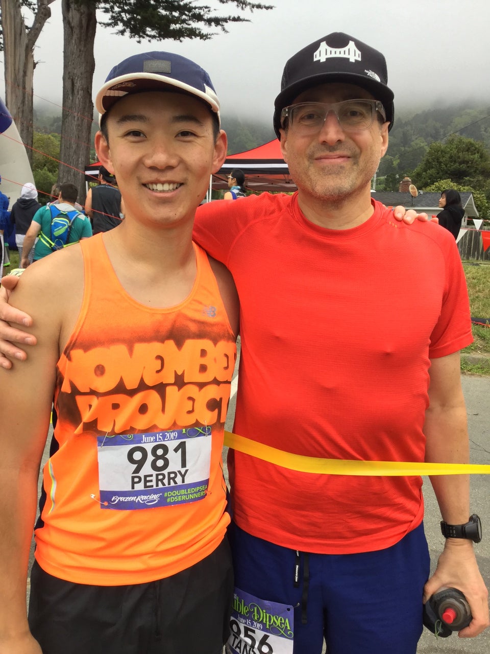 Perry and Tantek near the Double Dipsea race start, Tantek behind the yellow ribbon, race starting area behind them