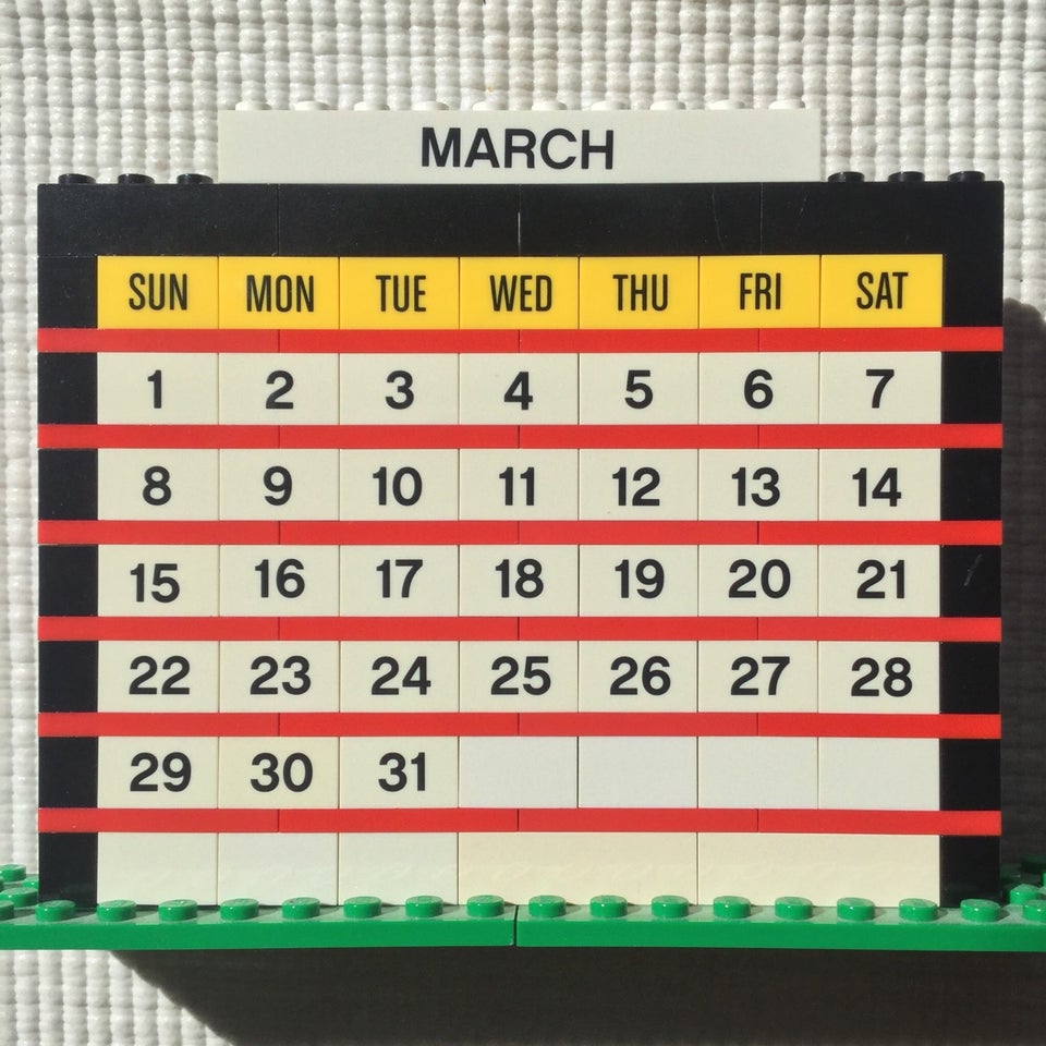 March of 2020 month calendar built from LEGO bricks, on an off-white background.